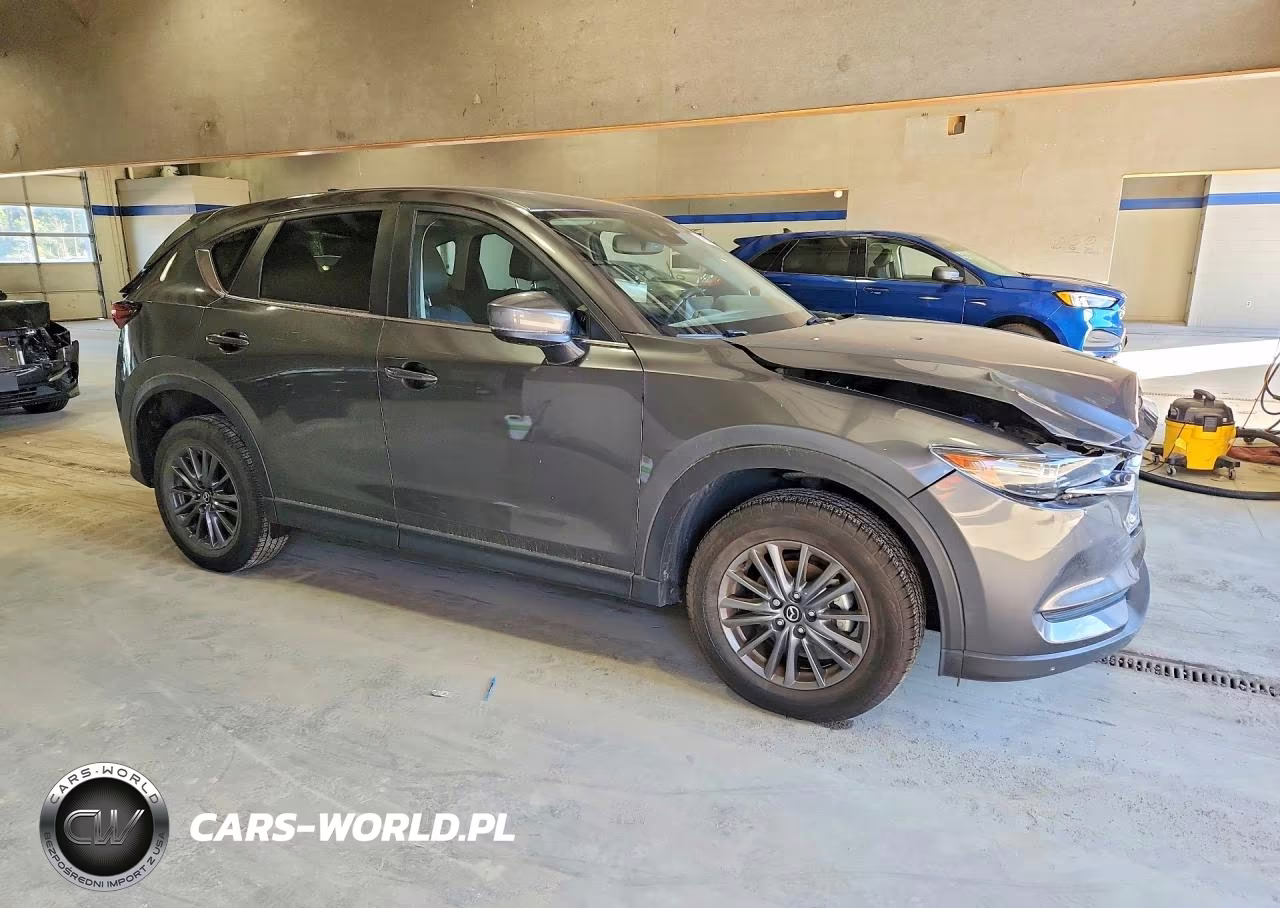 2021 Mazda Cx-5 Touring VIN:JM3KFBCM8M1385915 - 4
