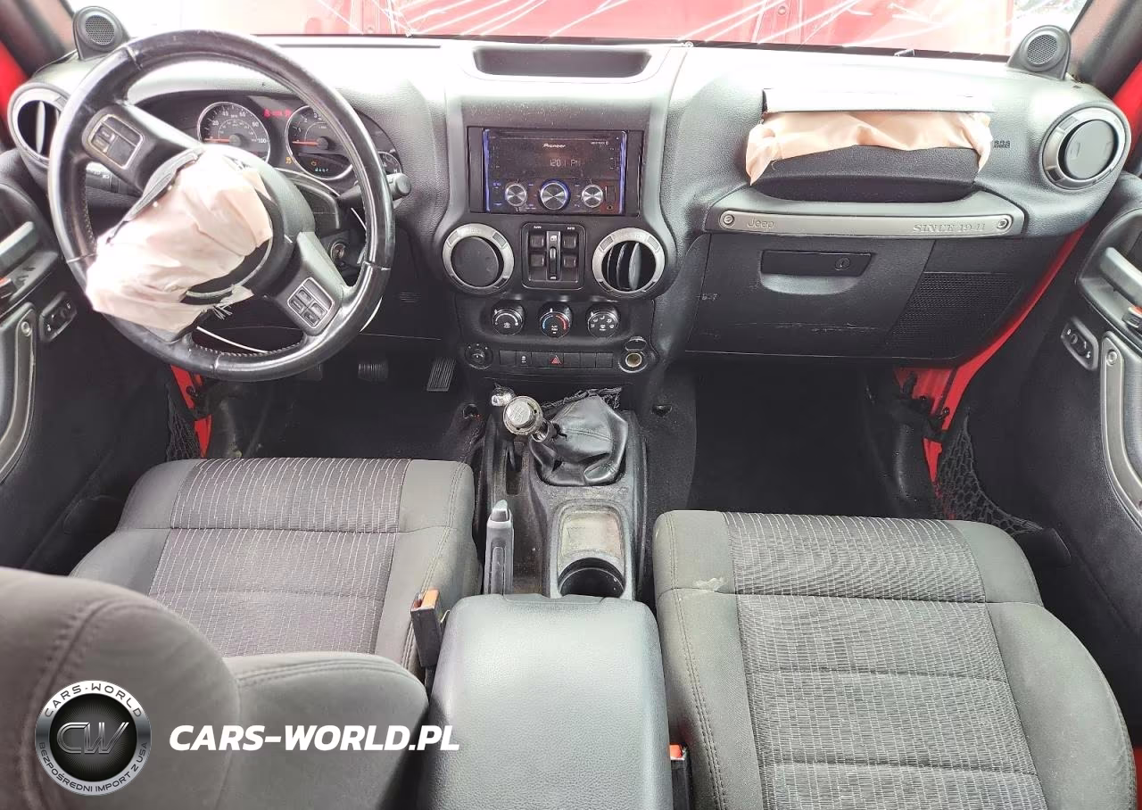 2012 Jeep Wrangler Unlimited Sport VIN:1C4BJWDG9CL243065 - 8