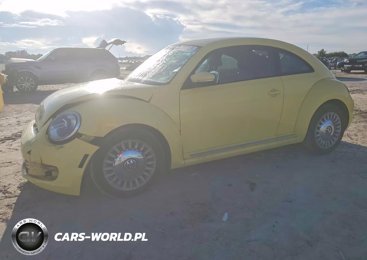 2014 Volkswagen Beetle VIN:3VWJX7AT6EM628938 - 1