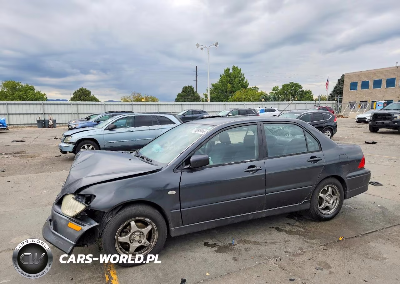 2002 Mitsubishi Lancer Oz Rally VIN:JA3AJ86E72U072701 - 1