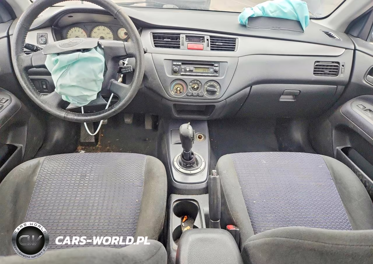 2002 Mitsubishi Lancer Oz Rally VIN:JA3AJ86E72U072701 - 8