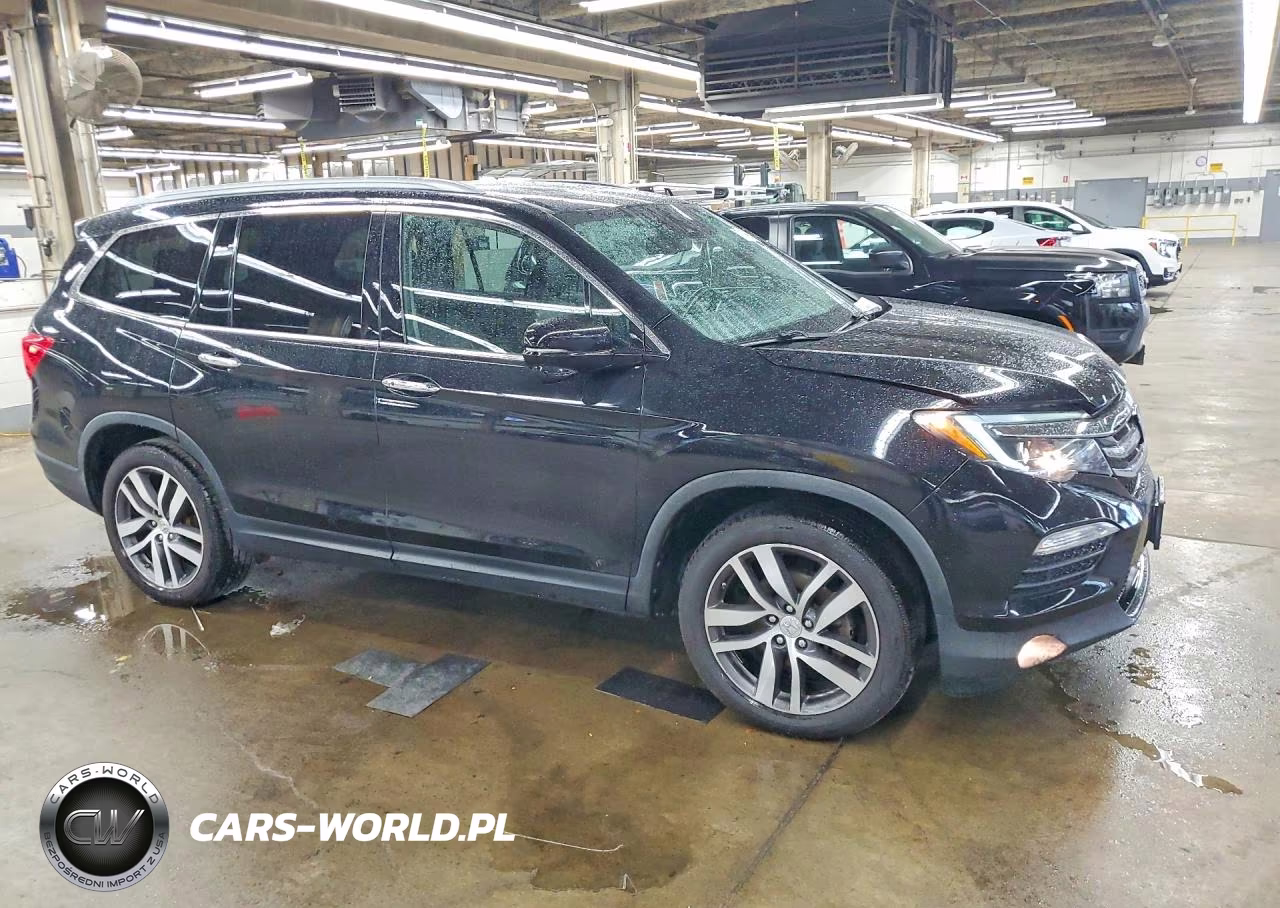 2017 Honda Pilot Touring VIN:5FNYF6H91HB027874 - 4