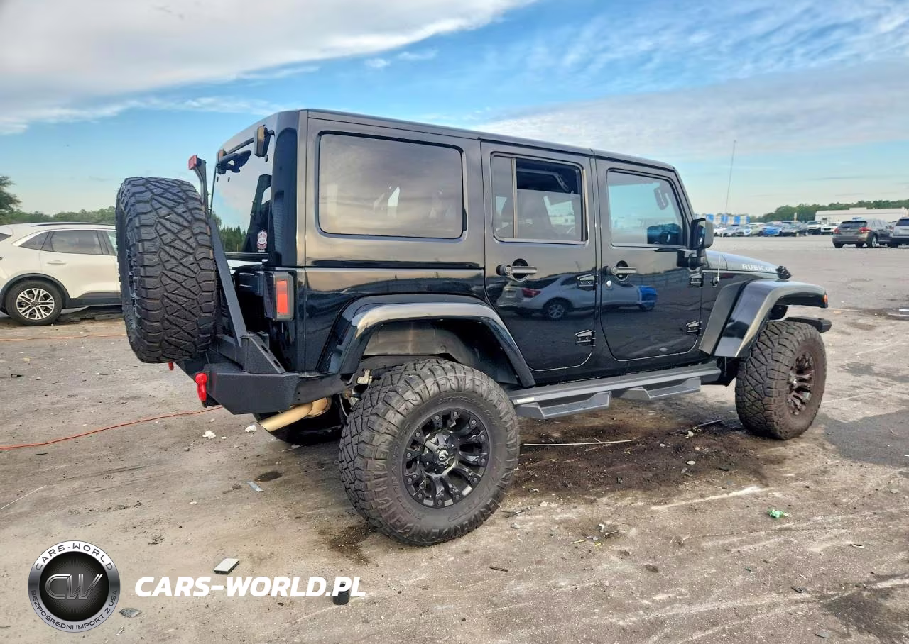2013 Jeep Wrangler Unlimited Rubicon VIN:1C4BJWFGXDL571805 - 3
