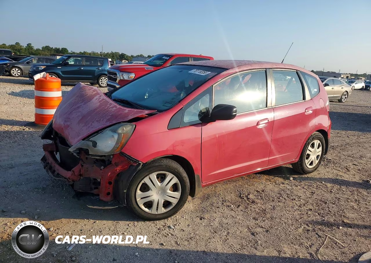 2009 Honda Fit VIN:JHMGE88219S031035 - 1