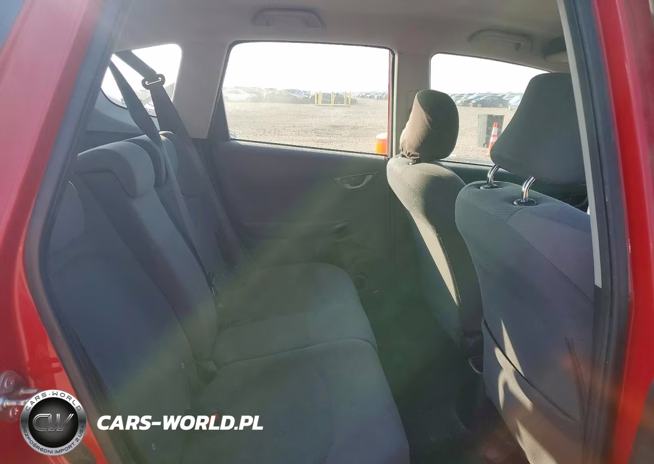2009 Honda Fit VIN:JHMGE88219S031035 - 10