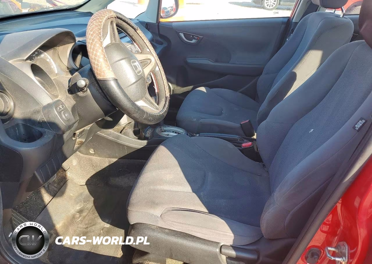 2009 Honda Fit VIN:JHMGE88219S031035 - 7