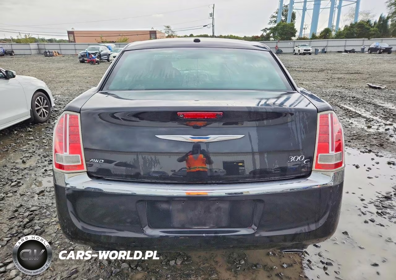 2014 Chrysler 300C VIN:2C3CCAKT2EH183880 - 6