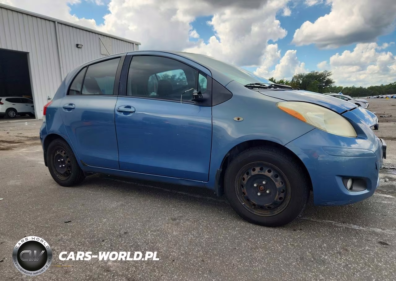 2009 Toyota Yaris Base VIN:JTDKT903195247235 - 4