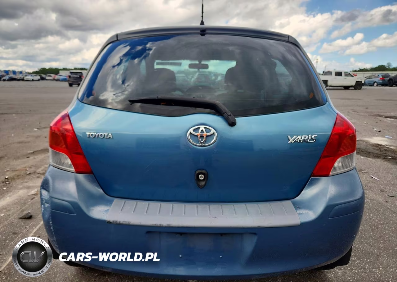2009 Toyota Yaris Base VIN:JTDKT903195247235 - 6