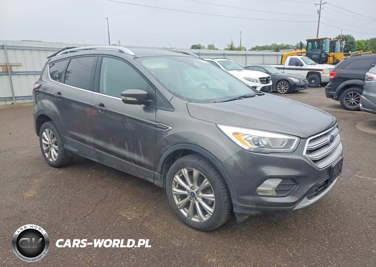 2017 Ford Escape Titanium VIN:1FMCU9J94HUC09082 - 4