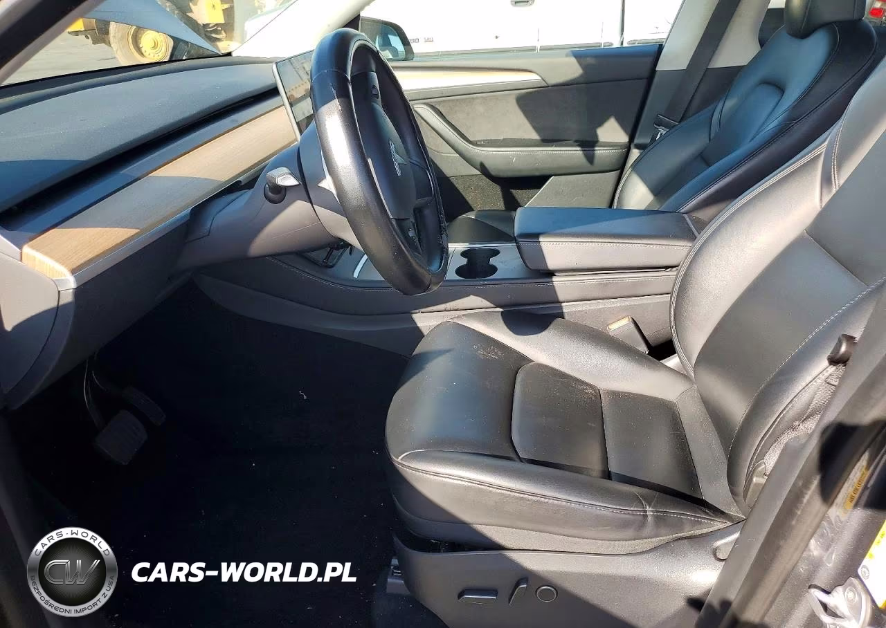 2023 Tesla Model Y VIN:7SAYGDEF2PA048534 - 7