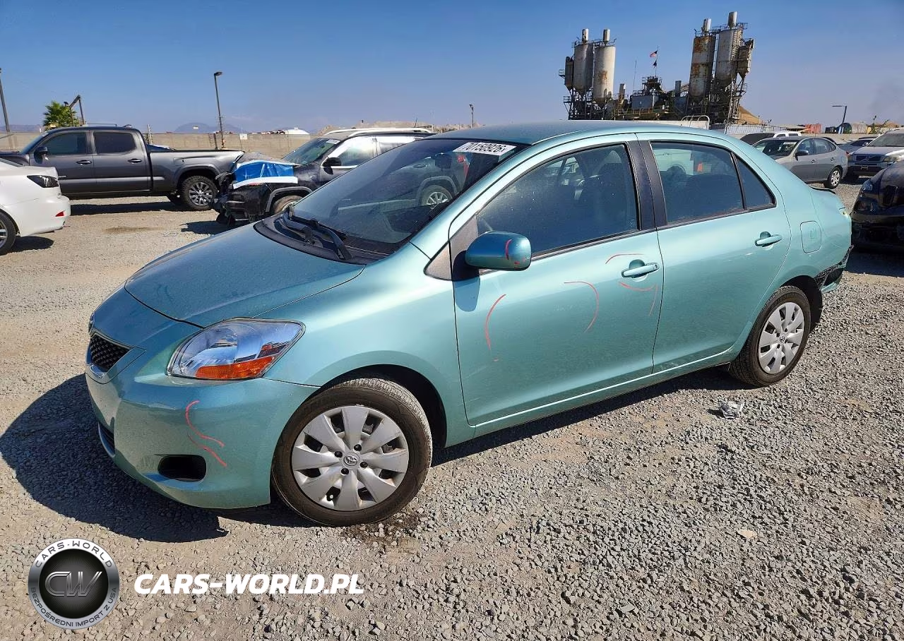 2009 Toyota Yaris Base VIN:JTDBT903X91335157 - 1