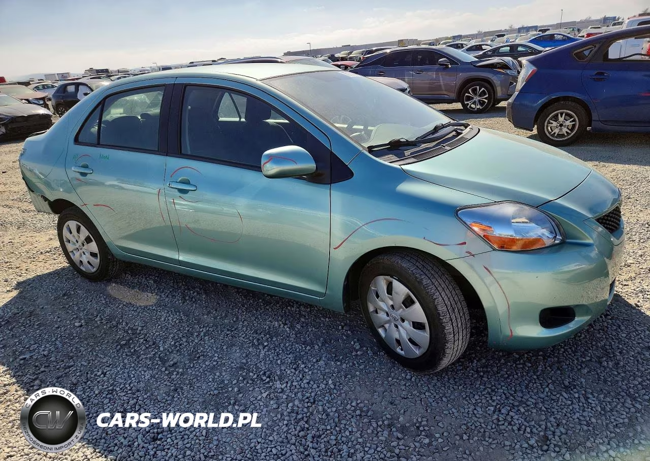 2009 Toyota Yaris Base VIN:JTDBT903X91335157 - 4