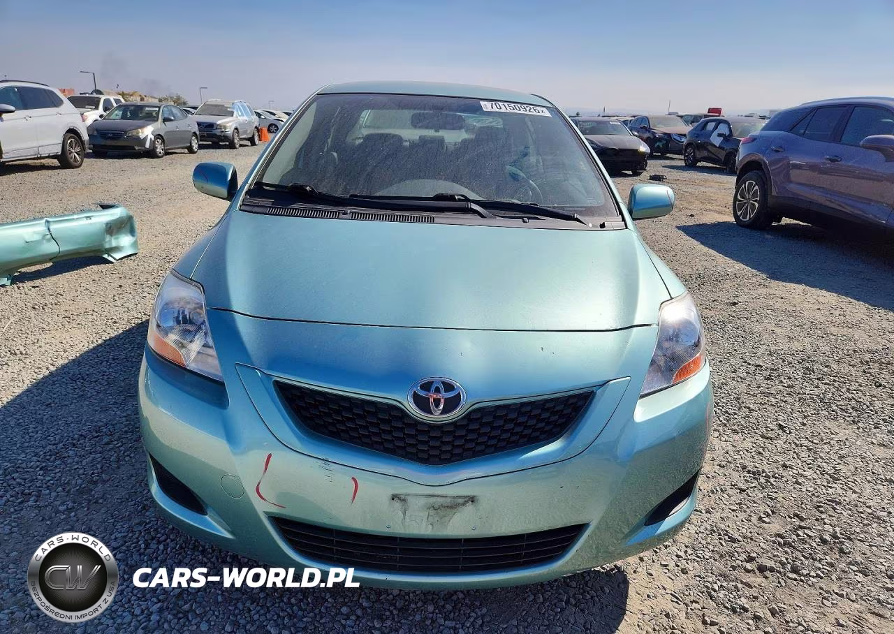 2009 Toyota Yaris Base VIN:JTDBT903X91335157 - 5
