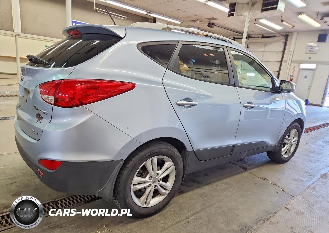 2012 Hyundai Tucson VIN:KM8JUCAC1CU396547 - 3