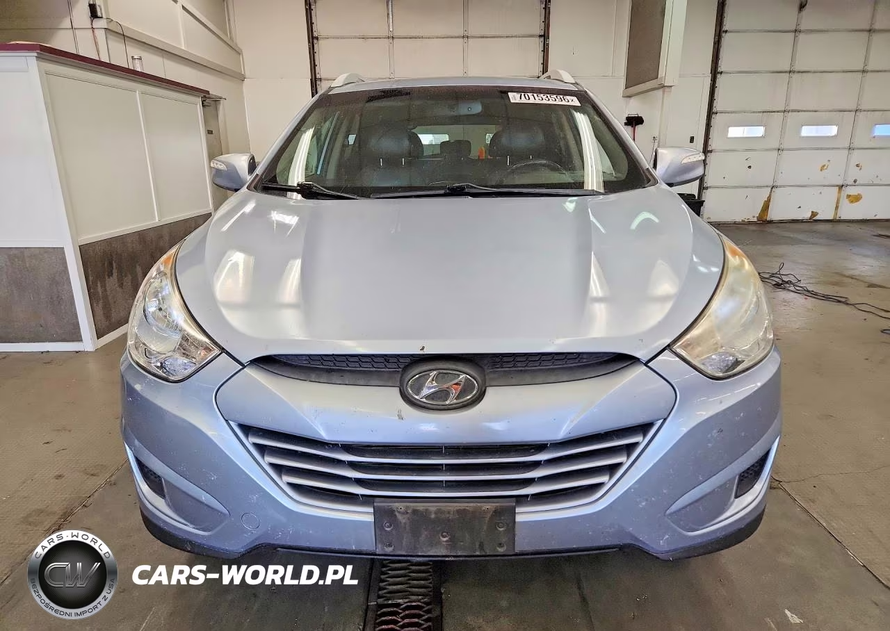2012 Hyundai Tucson VIN:KM8JUCAC1CU396547 - 5