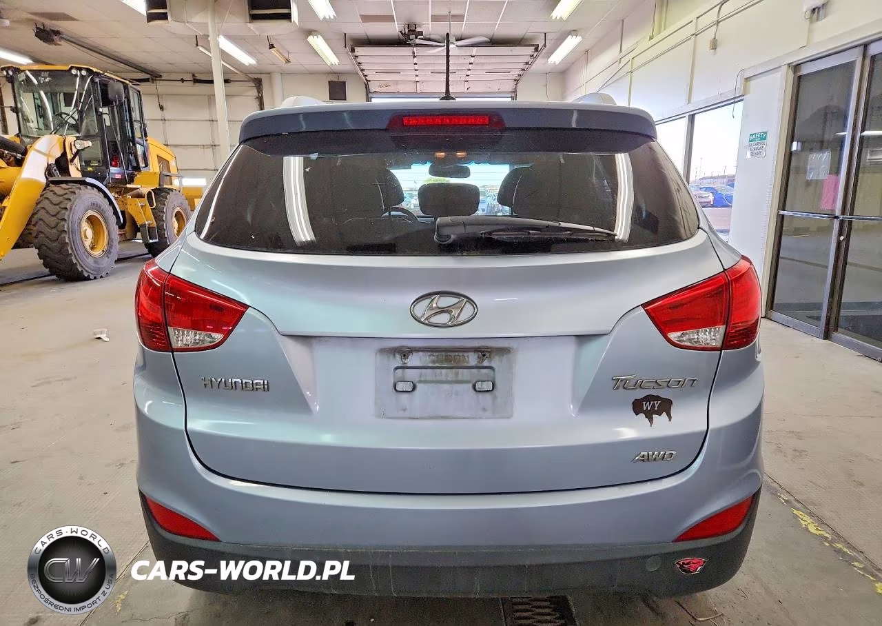 2012 Hyundai Tucson VIN:KM8JUCAC1CU396547 - 6
