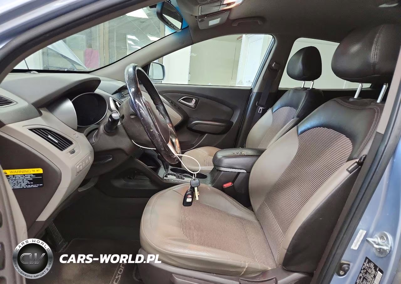 2012 Hyundai Tucson VIN:KM8JUCAC1CU396547 - 7