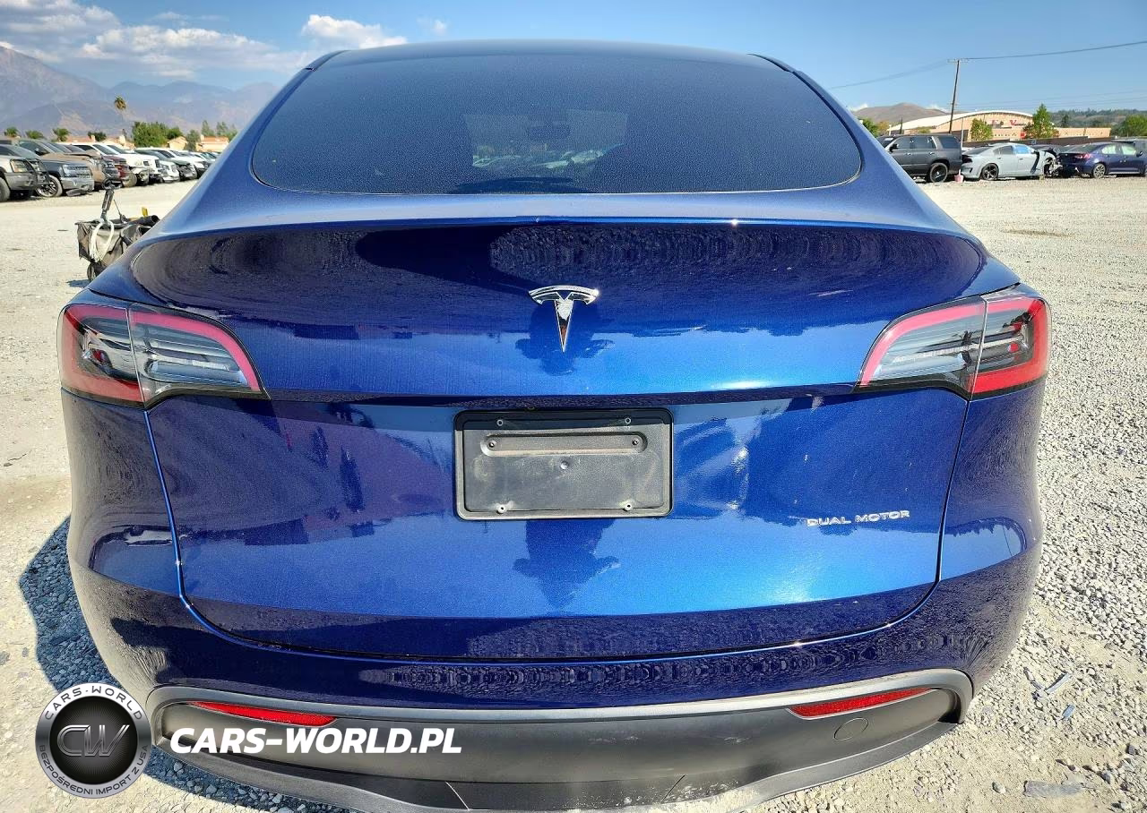 2023 Tesla Model Y VIN:7SAYGAEE4PF615495 - 6