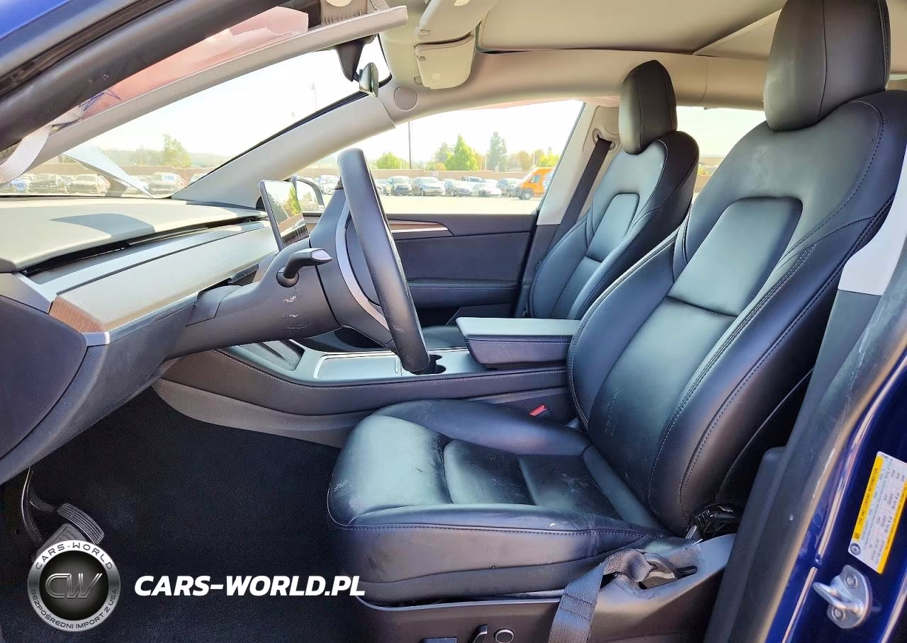 2023 Tesla Model Y VIN:7SAYGAEE4PF615495 - 7