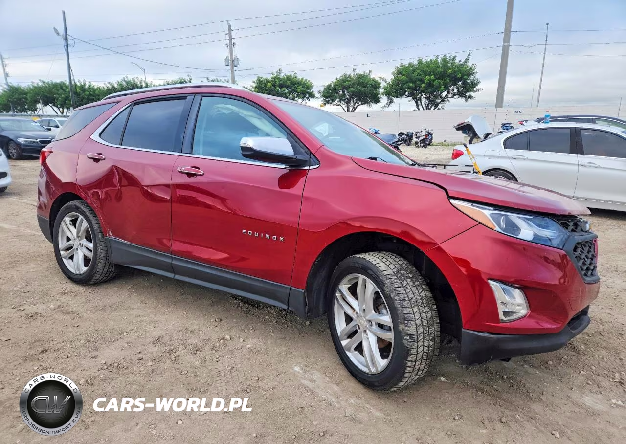 2018 Chevrolet Equinox Premier VIN:3GNAXMEV3JL107938 - 4