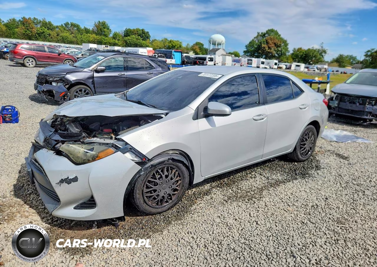 2017 Toyota Corolla Le VIN:2T1BURHEXHC812201 - 1