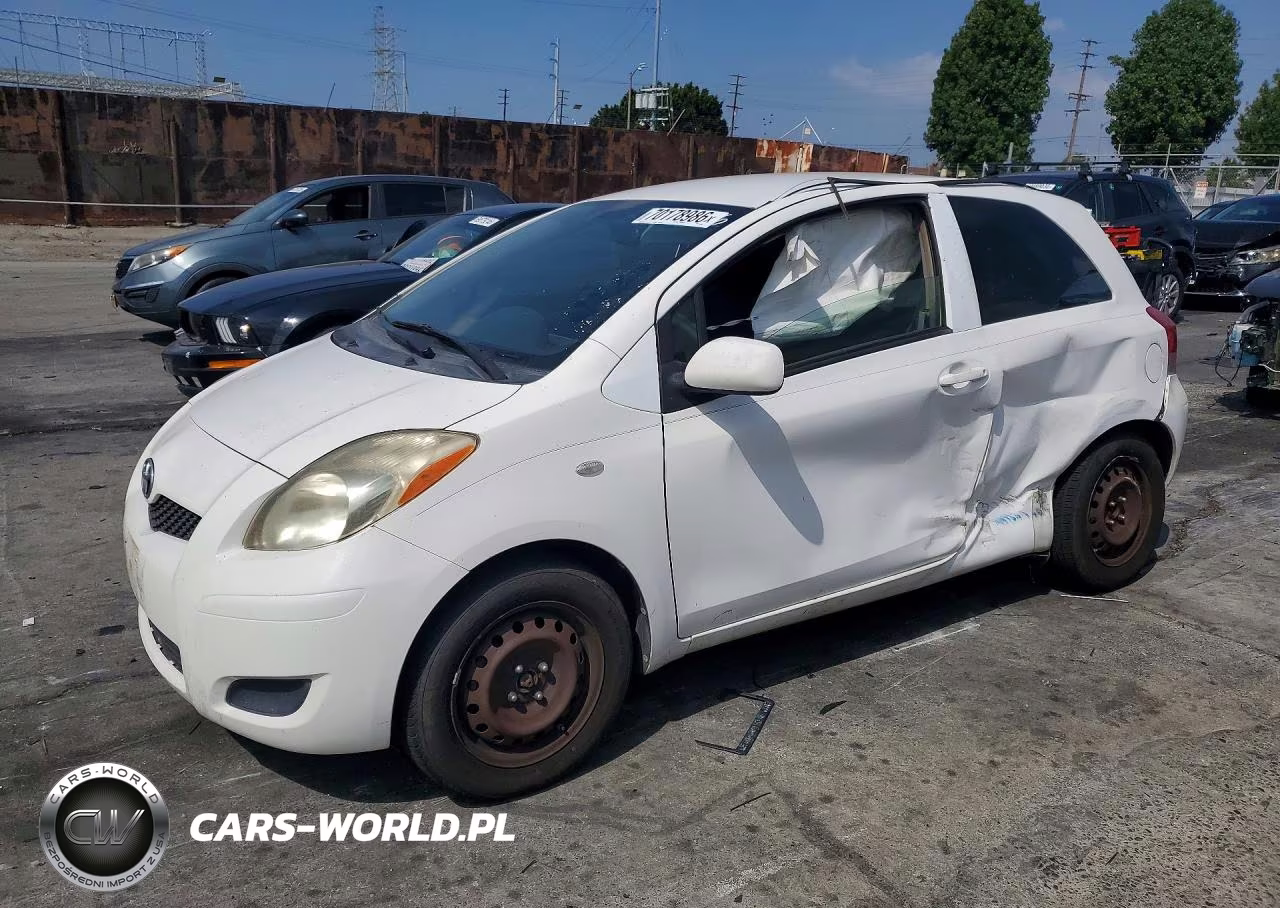 2009 Toyota Yaris Base VIN:JTDJT903995232588 - 1