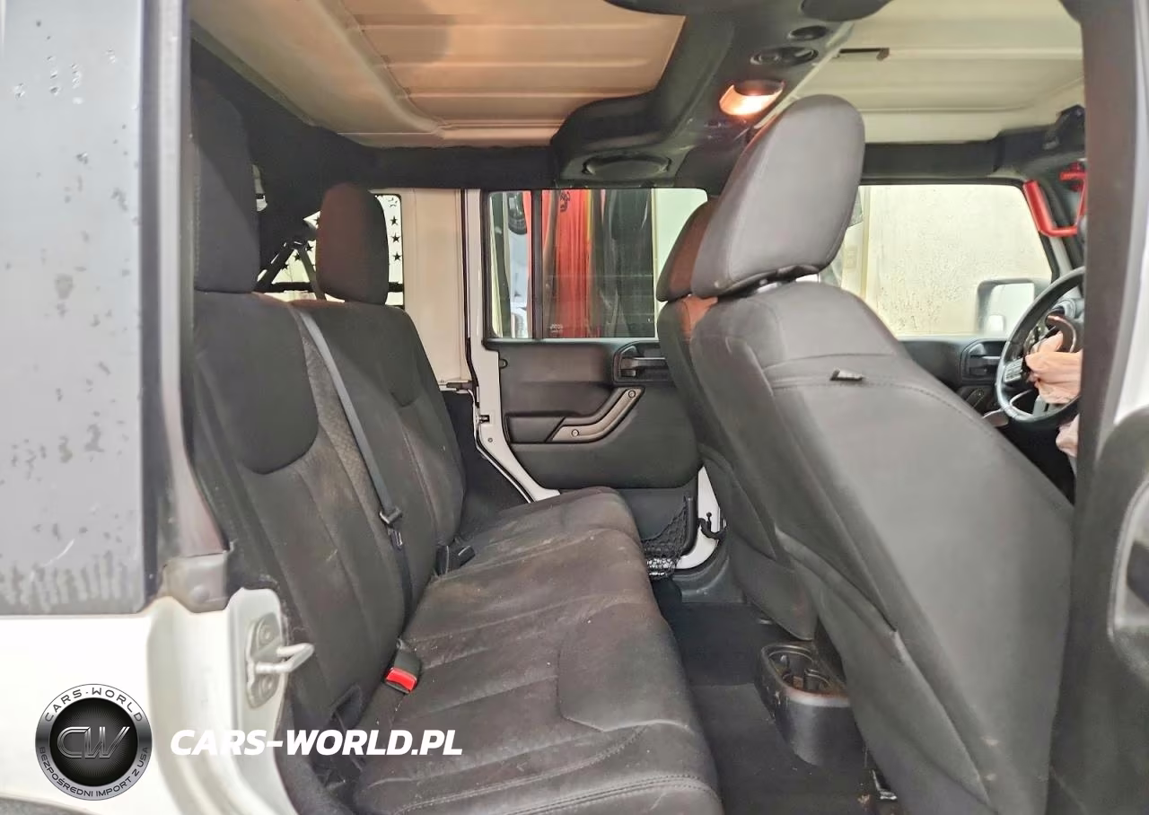 2013 Jeep Wrangler Unlimited Sport VIN:1C4HJWDG4DL623376 - 11