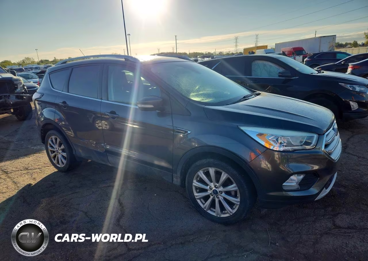 2017 Ford Escape Titanium VIN:1FMCU0JD5HUD38237 - 4