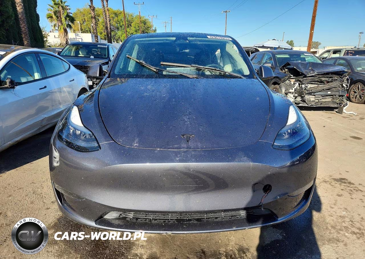 2023 Tesla Model Y VIN:7SAYGAEE9PF713860 - 5