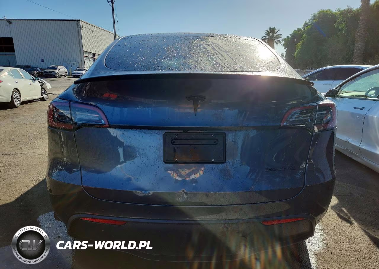 2023 Tesla Model Y VIN:7SAYGAEE9PF713860 - 6