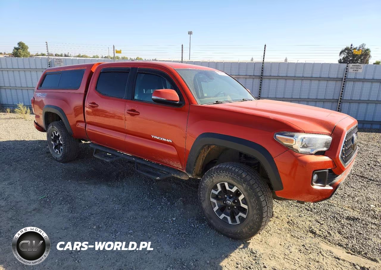 2018 Toyota Tacoma Trd Off-Road VIN:3TMDZ5BN4JM050105 - 4