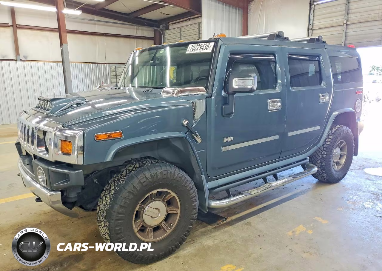 2006 Hummer H2 VIN:5GRGN23U16H100465 - 1