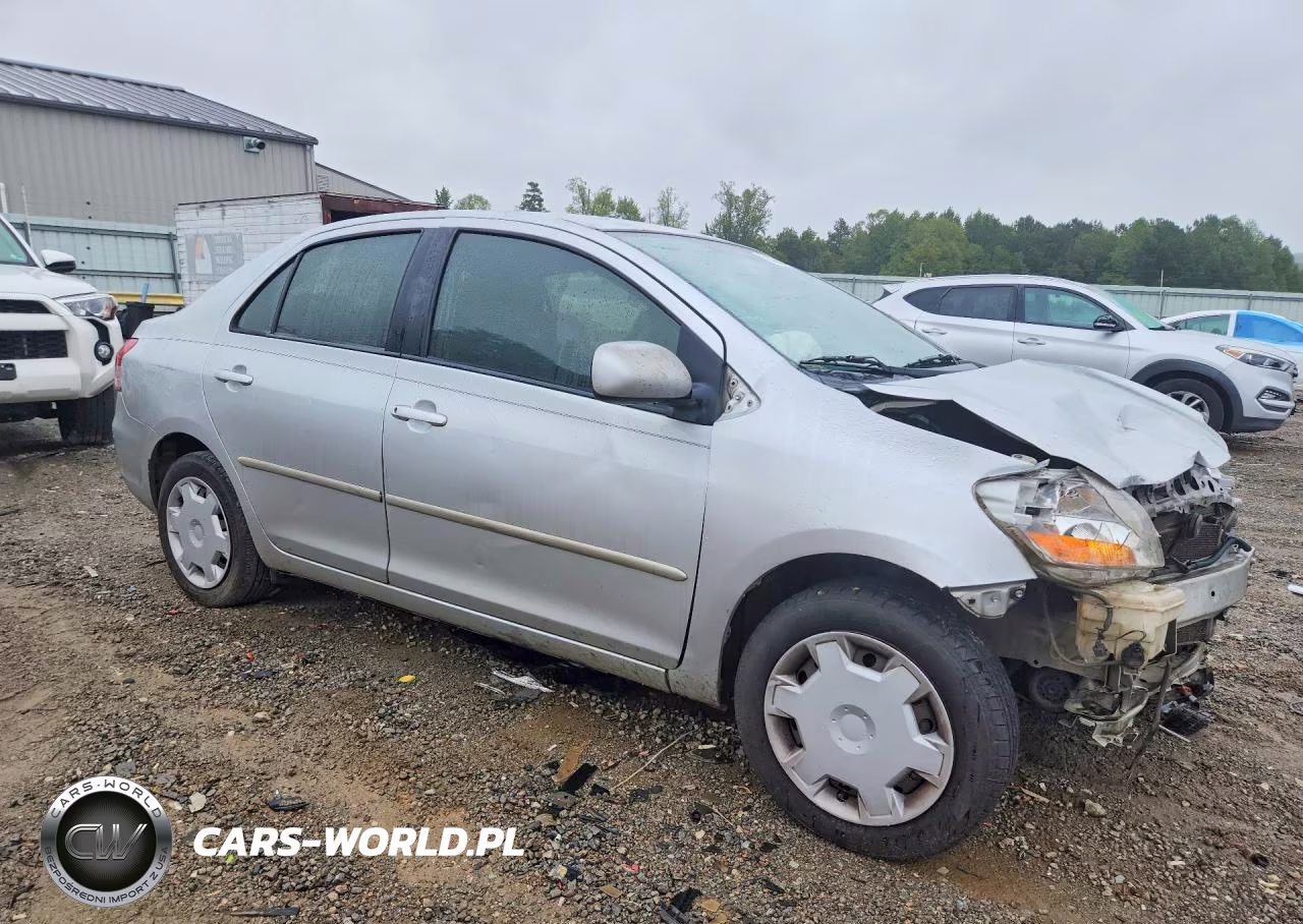 2009 Toyota Yaris Base VIN:JTDBT903091320375 - 4