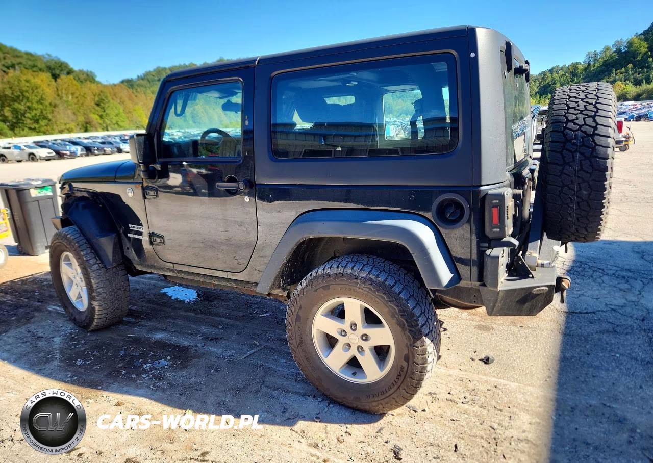 2015 Jeep Wrangler Sport VIN:1C4AJWAG3FL720710 - 2