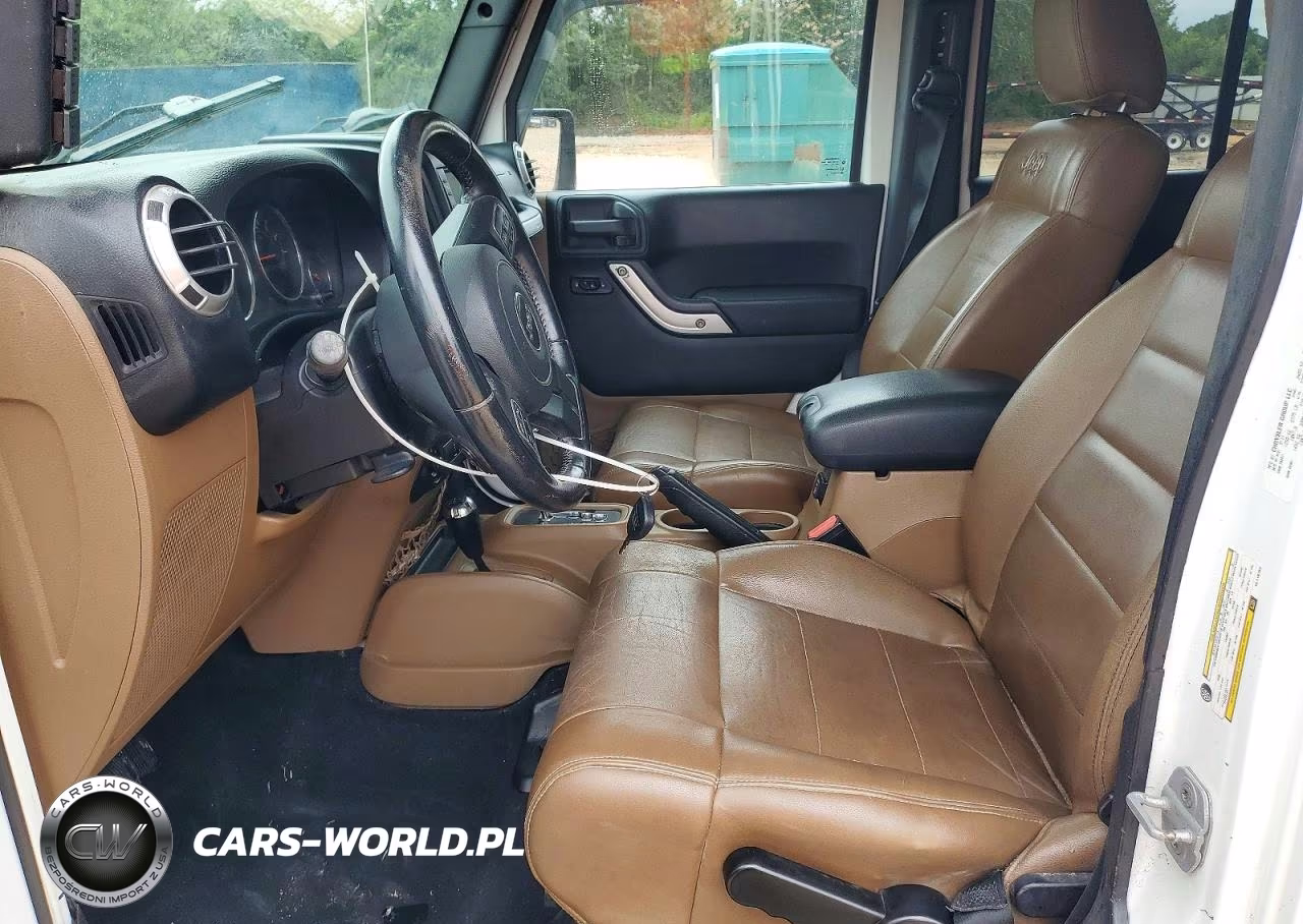 2012 Jeep Wrangler Unlimited Sahara VIN:1C4BJWEG1CL118754 - 7
