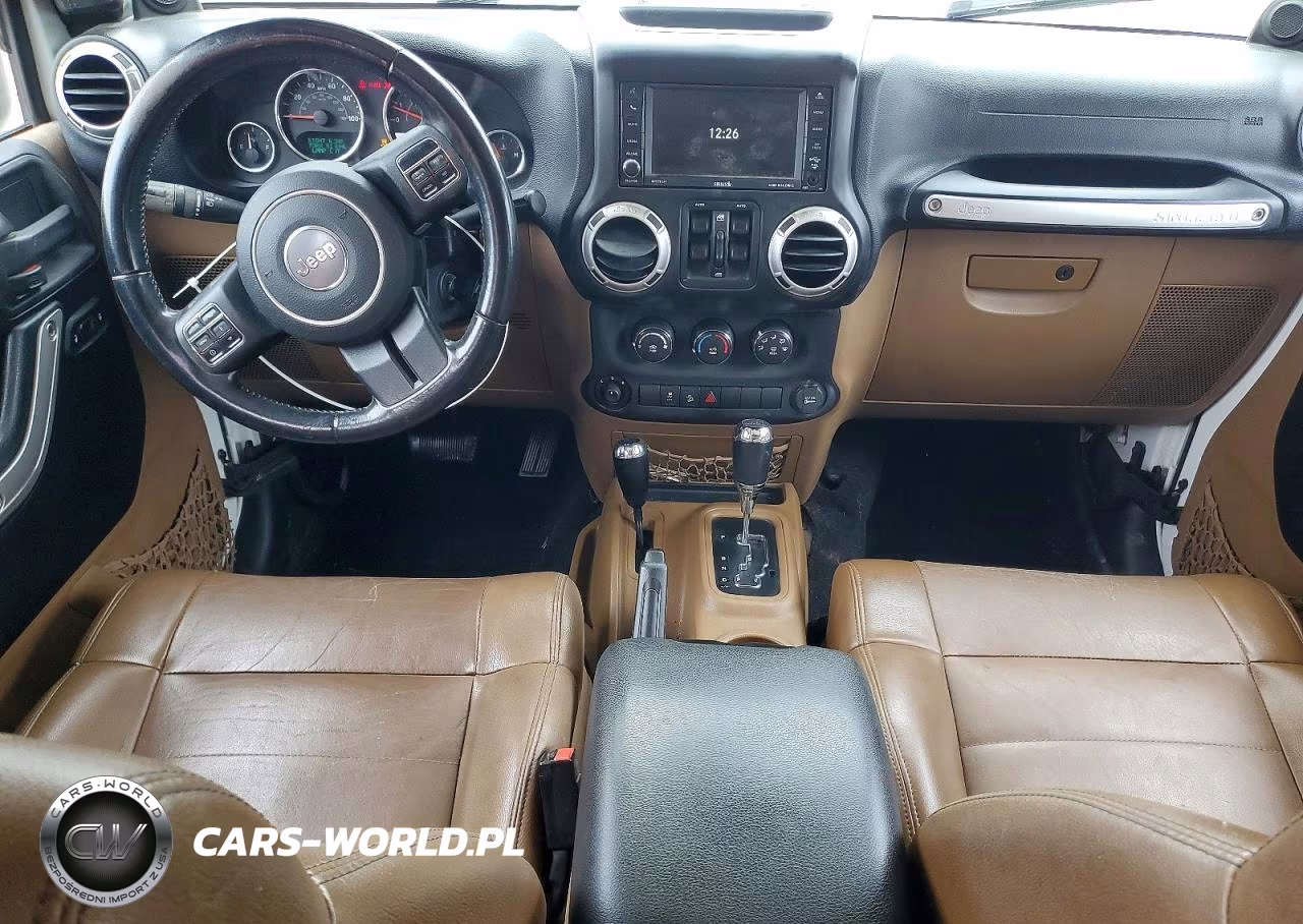 2012 Jeep Wrangler Unlimited Sahara VIN:1C4BJWEG1CL118754 - 8