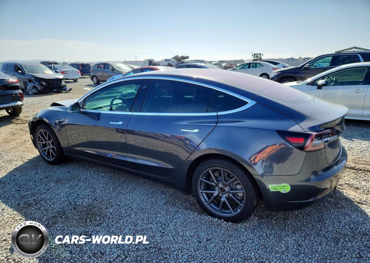 2018 Tesla Model 3 VIN:5YJ3E1EB2JF128600 - 2