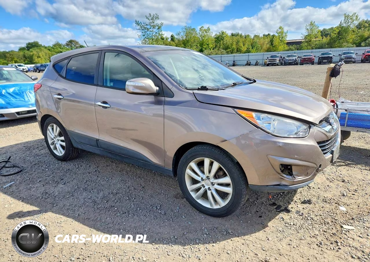 2012 Hyundai Tucson Limited VIN:KM8JUCAC2CU371186 - 4