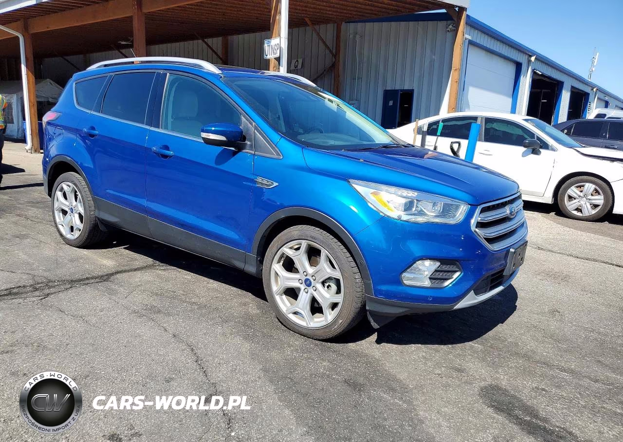 2017 Ford Escape Titanium VIN:1FMCU9J95HUB43612 - 4
