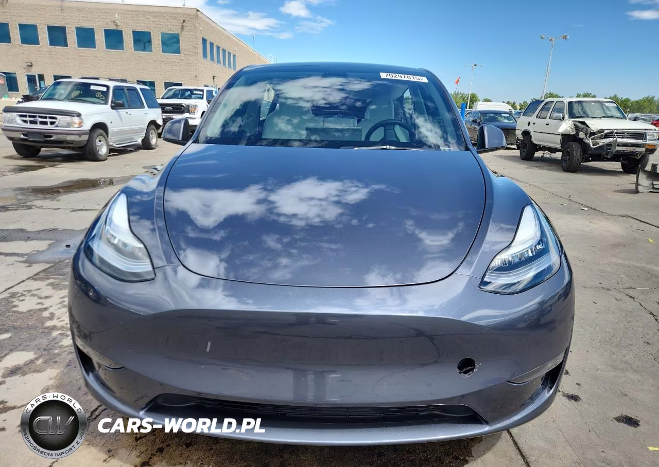 2023 Tesla Model Y VIN:7SAYGDEE8PA150136 - 5