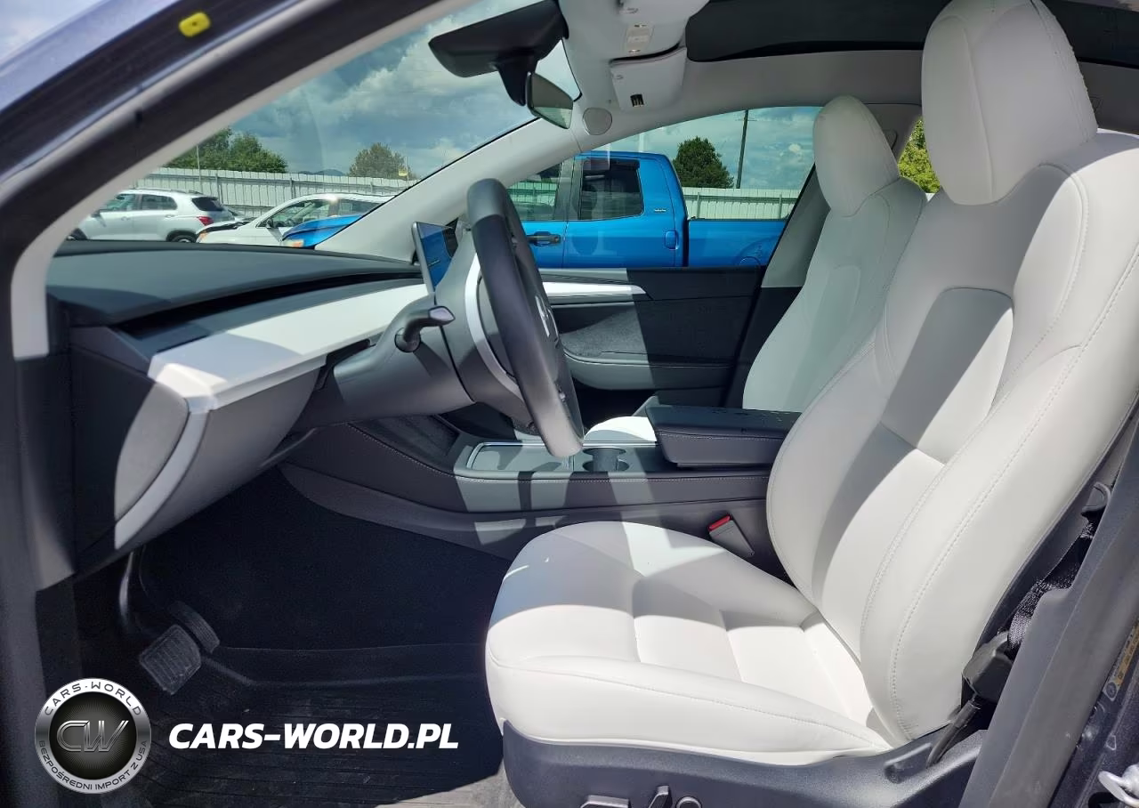 2023 Tesla Model Y VIN:7SAYGDEE8PA150136 - 7