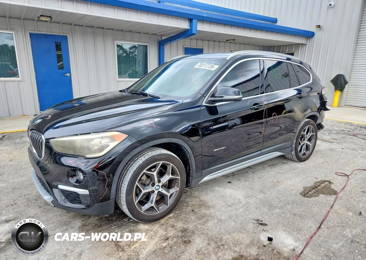 2018 BMW X1 xDrive28I VIN:WBXHT3Z36J4A66609 - 1