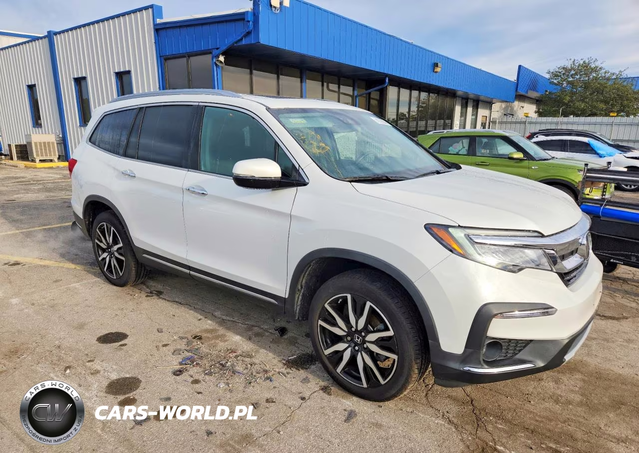 2022 Honda Pilot Elite VIN:5FNYF6H09NB015646 - 4