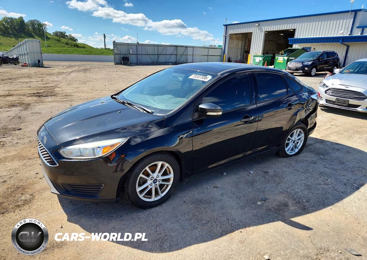 2015 Ford Focus 4D VIN:1FADP3F29FL253452 - 1