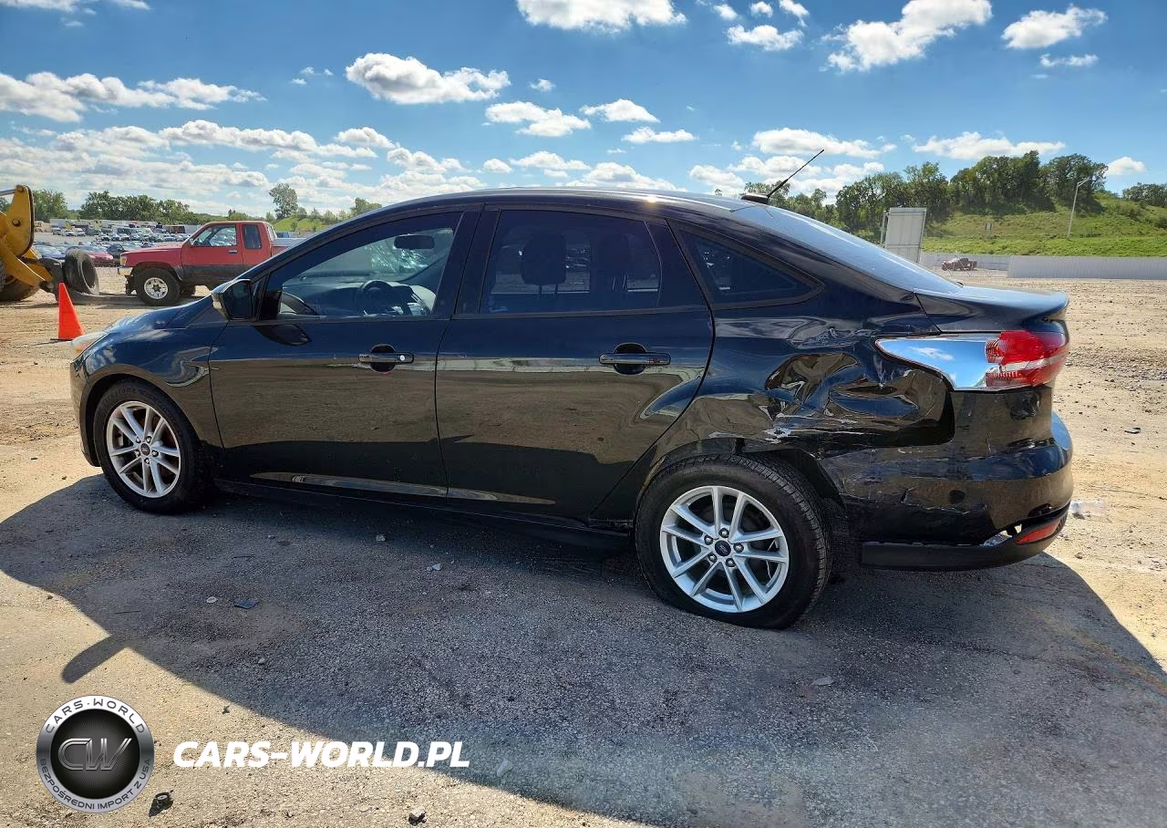 2015 Ford Focus 4D VIN:1FADP3F29FL253452 - 2