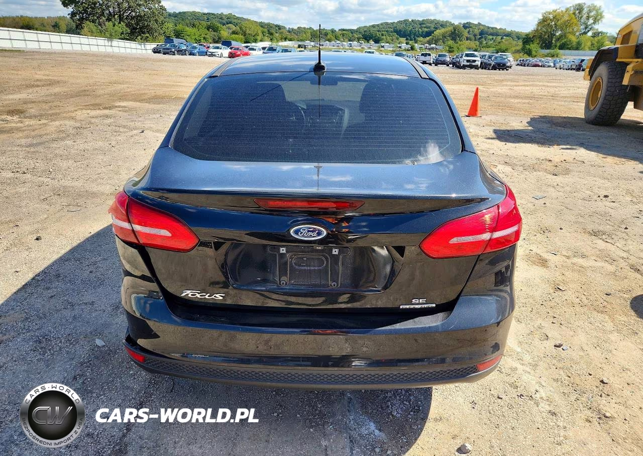 2015 Ford Focus 4D VIN:1FADP3F29FL253452 - 6