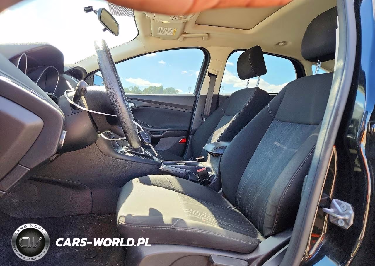 2015 Ford Focus 4D VIN:1FADP3F29FL253452 - 7