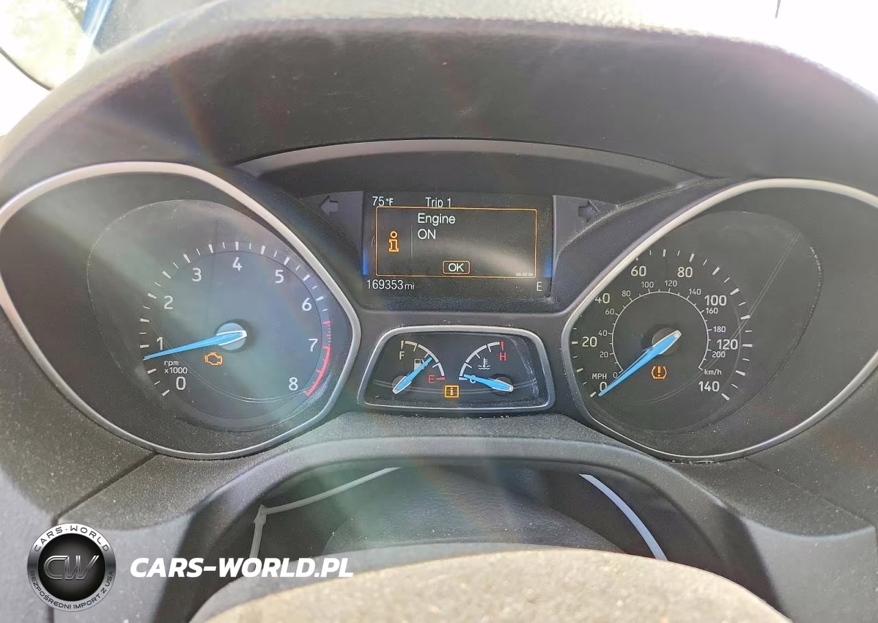 2015 Ford Focus 4D VIN:1FADP3F29FL253452 - 9