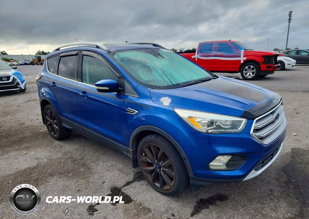 2017 Ford Escape Titanium VIN:1FMCU0J98HUA75852 - 4